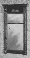 The Empire style has columns at the sides and gilt
ornaments.